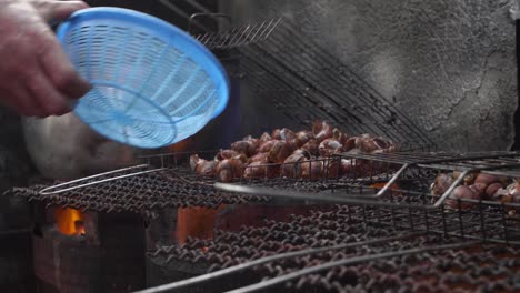 Adding-Snails-to-Barbecue-Close-Up