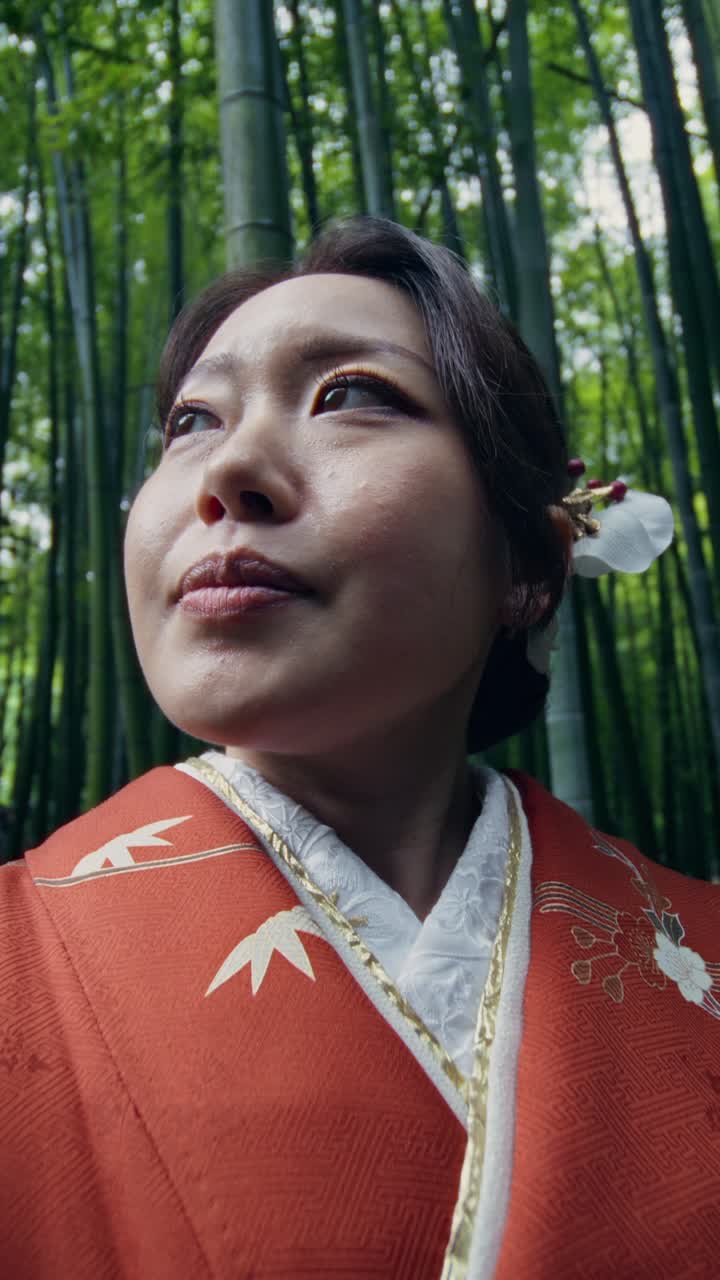 Woman in Kimono in a Bamboo Forest