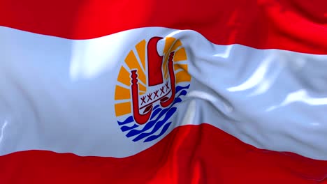 bandera de la polinesia francesa ondeando en el viento animación en cámara lenta. 4k textura de tela realista bandera soplando suavemente en un día de viento fondo de bucle continuo sin costuras.