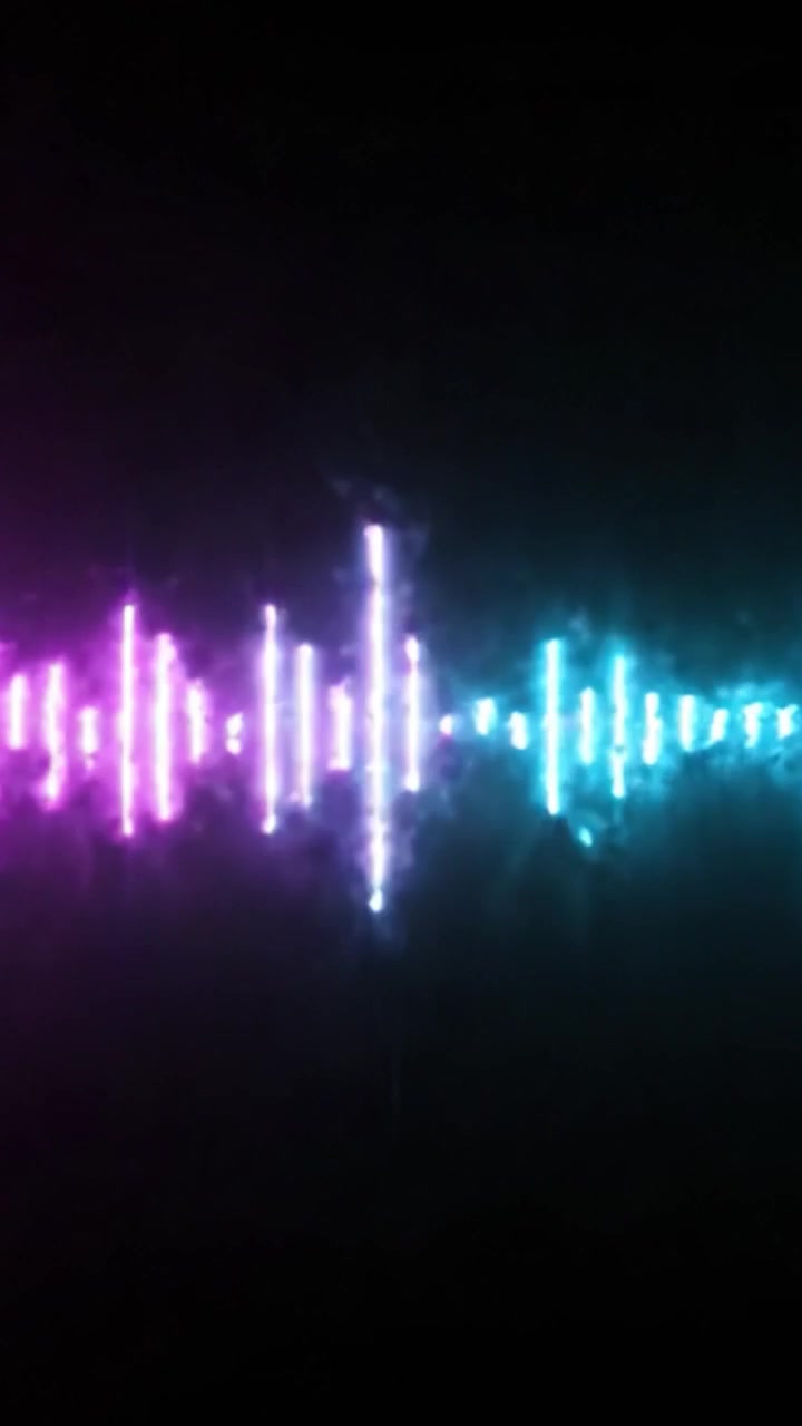 Dynamic Display of Sound Waves: A Captivating Transition from Blue-hued Pulses to Vibrant Purple Patterns Showcasing the Rhythm of Music