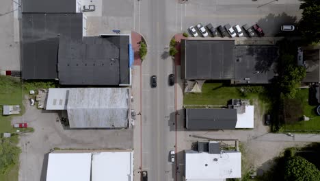 new era, michigan downtown with drone video overhead moving forward.