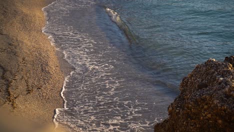 stunning scenery at golden beach with slow motion breaking waves