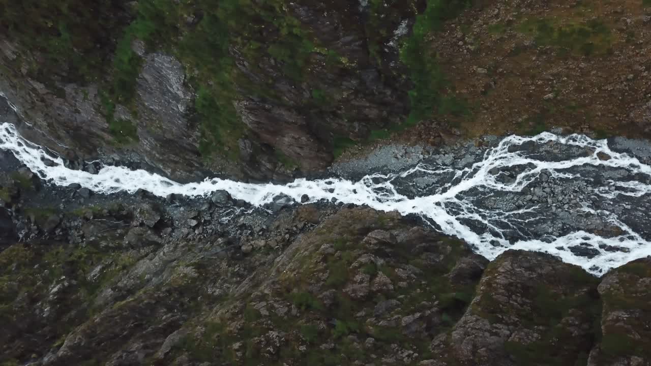 Vertical Aerial View of Creek Waterrall in Queulat National Park, Patanogia, Chile
