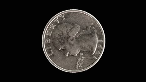 united states 1991 quarter dollar coin obverse with washington portrait and motto rotating on black background