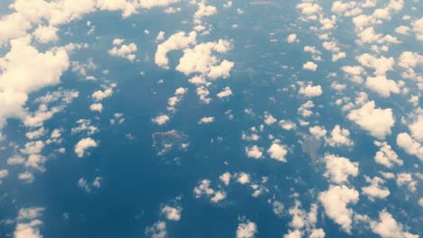 traveling by air above clouds