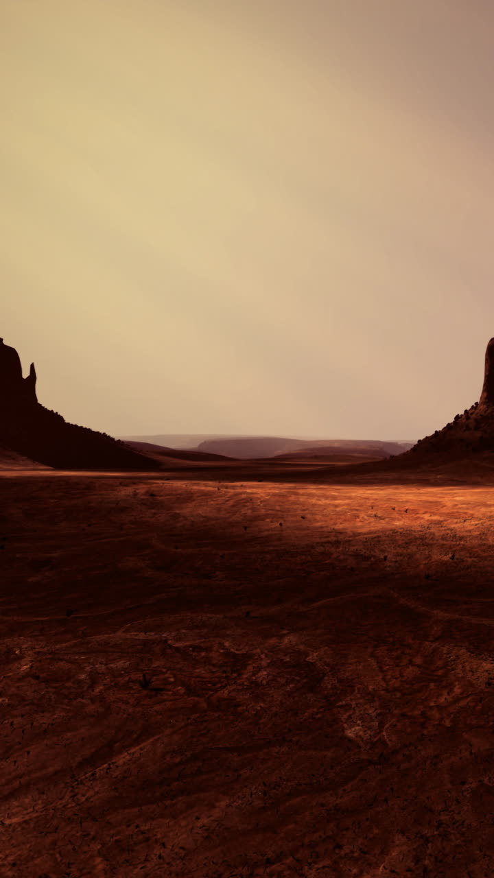 Formazione terrestre con scogliere e paesaggio arancione al tramonto in un'area desertica