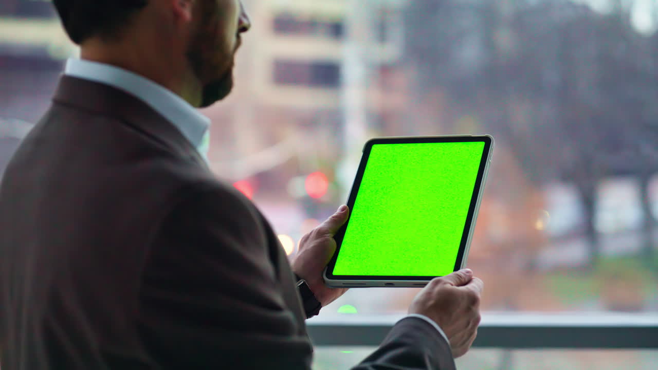 Executive using chroma key tablet in office closeup. Employee navigating mockup