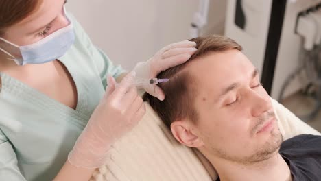 hair mesotherapy procedure in the modern cosmetology clinic