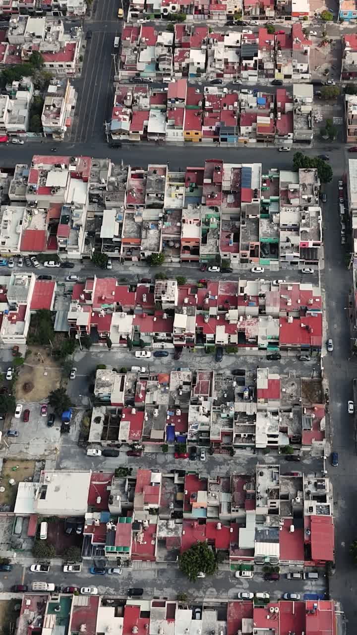 Vertical drone footage showcasing a populated neighborhood in Ecatepec, Mexico