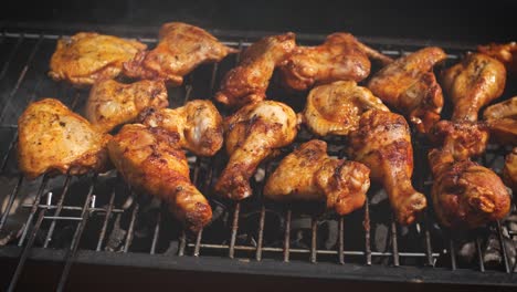 delicious chicken pieces frying on barbecue grill