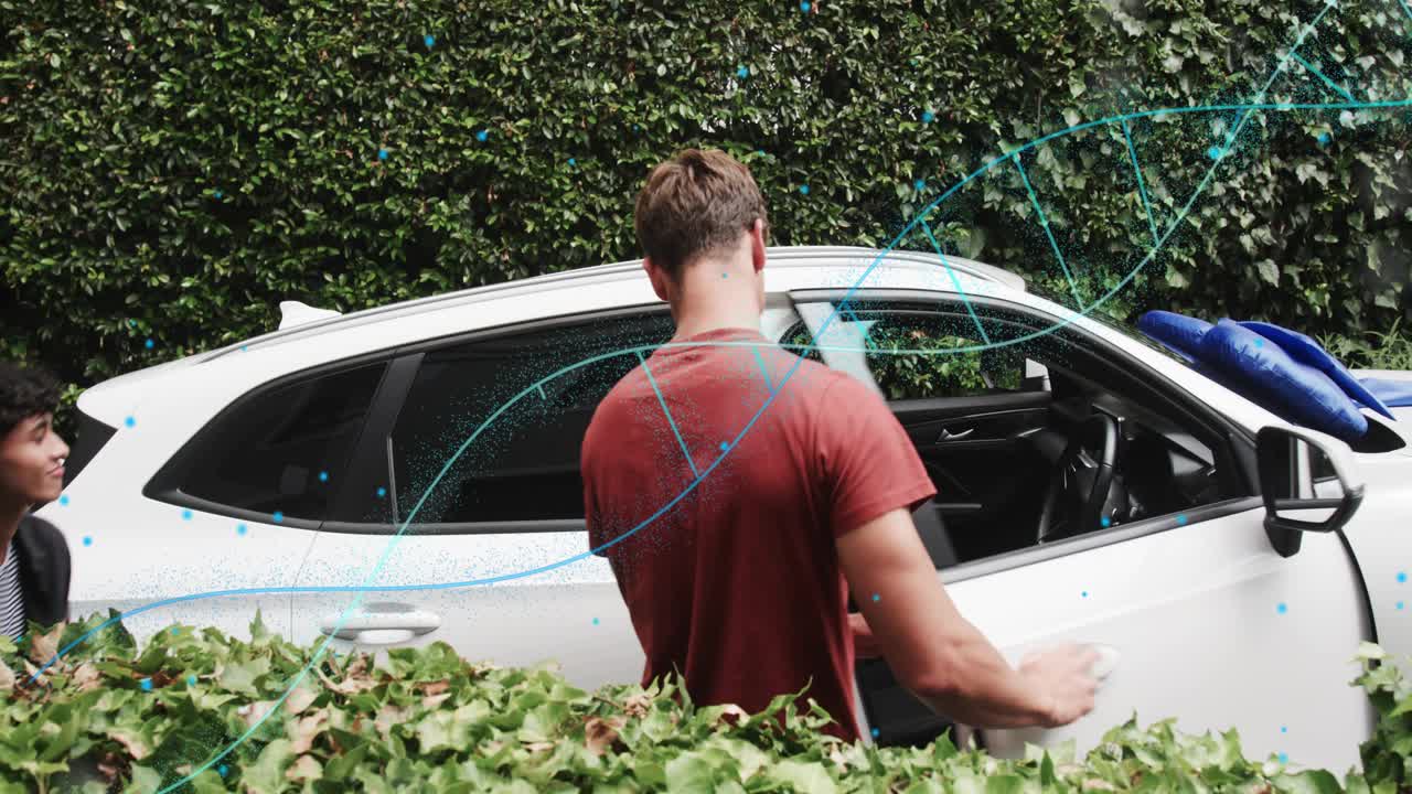 Man in red walking, grabbing item from SUV, friends watching while tech helix overlay spiraling