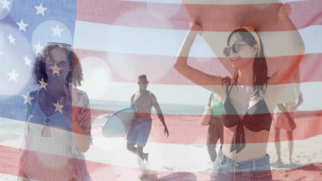 animación de la bandera de los ee.uu. sobre amigos diversos felices en la playa en verano
