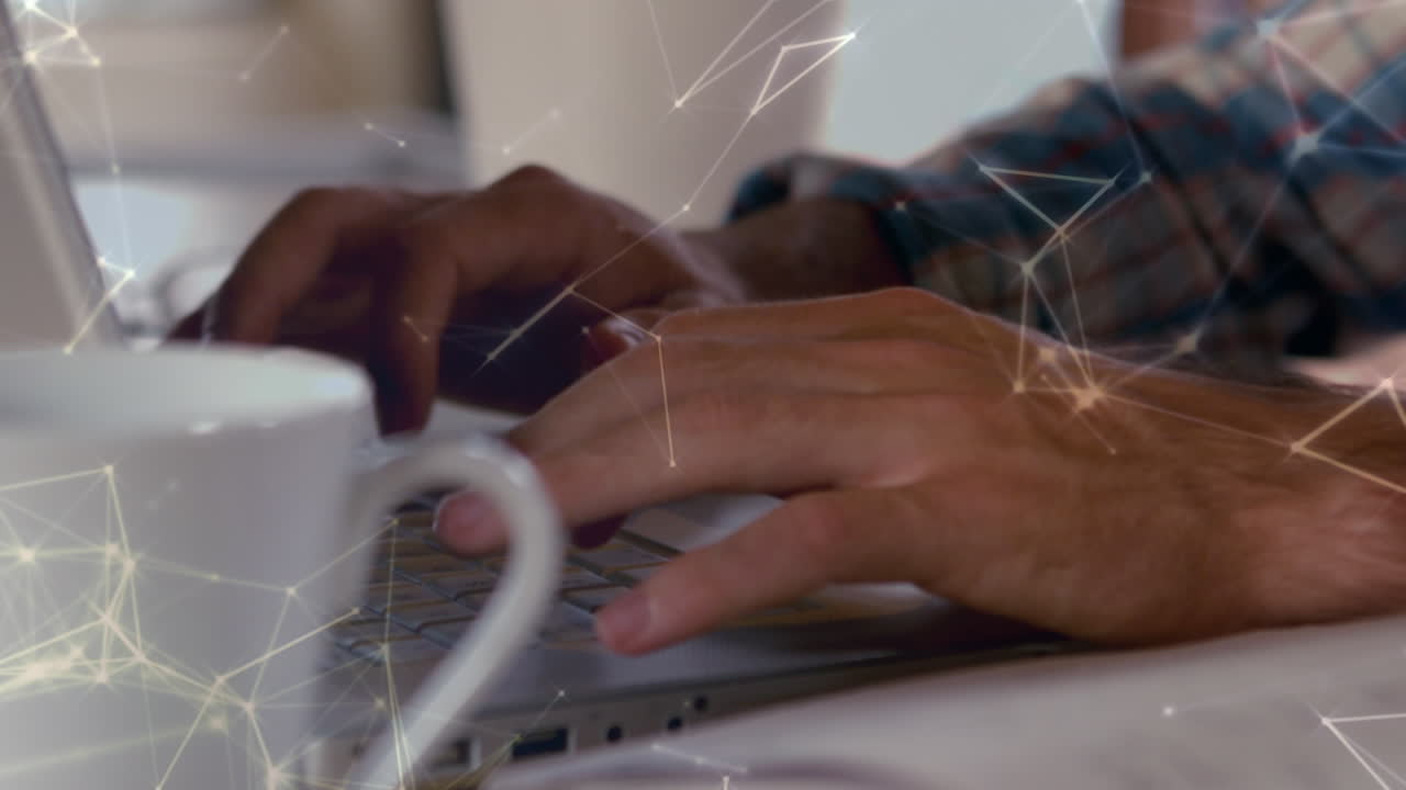Animation of connections over hands of african american man using laptop