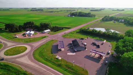 aerial view of a rural gas station and surrounding farmland