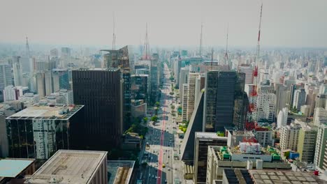 slow descending aerial shot of bussy avenida paulista in são paulo