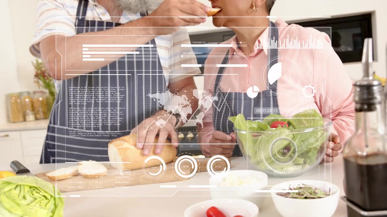 Uomo che affetta il pane su un tagliere mentre prepara il pasto, offre una fetta, donna che assaggia, tocco giocoso e prosegue.