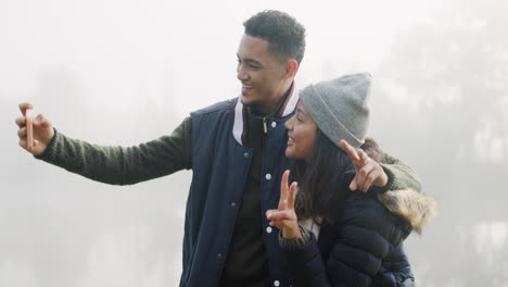 couple, camping and selfie with smile