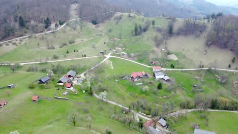 top view, flying over idyllic villa area early in spring