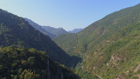 flight-over-green-mountains-and-rocks