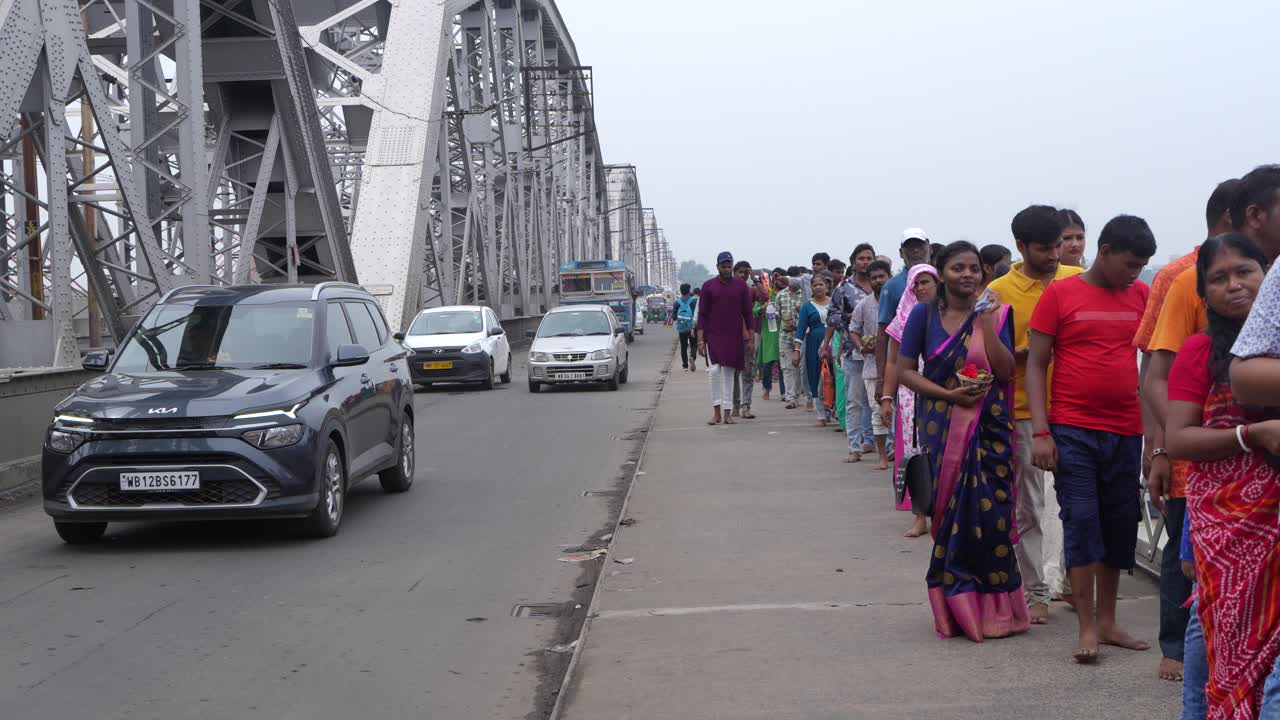 Gathering of people and Tarpan at Dakshineswar Temple in Kolkata on Mahalaya day on the eve of Durga Puja.