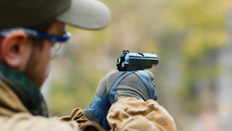 A-man-plays-airsoft-with-a-pistol-in-his-hand-3