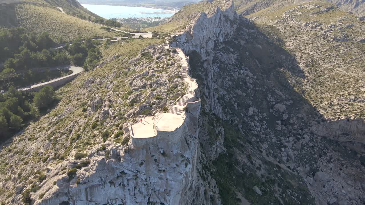 Experience panoramic vistas from Mirador es Colomer, showcasing the rugged cliffs and serene waters of Pollenca, Mallorca. Discover the natural beauty of this stunning location.