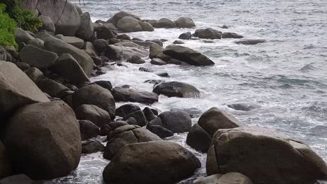 waves crashing against a rocky coastline