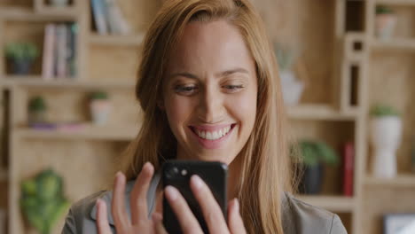 close up portrait of beautiful young woman using smartphone enjoying browsing online sending messaging smiling happy satisfaction