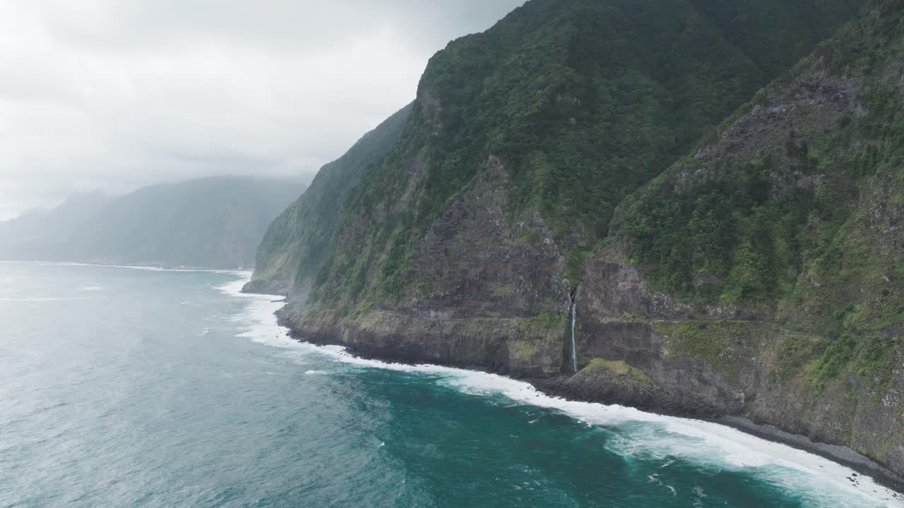 Waterfall Falling Into The Sea Near Miradouro do Véu da Noiva In Madeira, Portugal