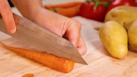 chopping carrots and potatoes