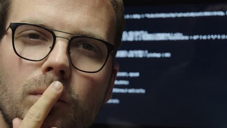 a man thinking about ai and developing an idea, with a blurred ai chatbot working in the background