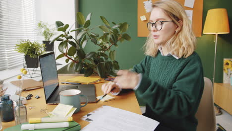 woman petting a dog in a cozy home office