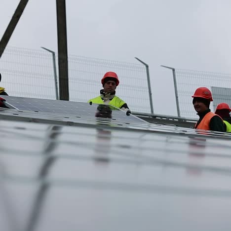 technician installing solar panels