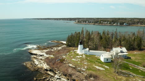 Beautiful-Aerial-of-Burnt-Island-Lighthouse-in-Southport,-Maine,-USA