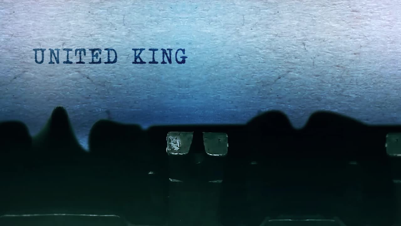 United kingdom word closeup being typing and centered on a sheet of paper on old vintage typewriter