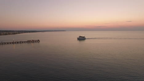 aerial flight above the sea and coast line on the horizon in greece