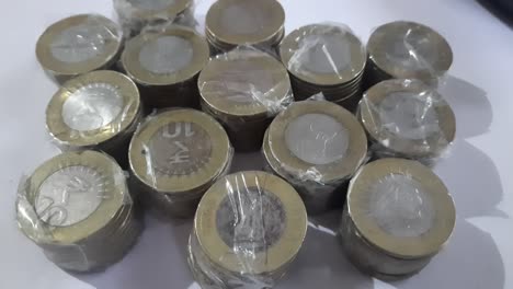 stack of indian rupee coins. pile of money indian coin isolated on white background. a bunch of indian currency coins.