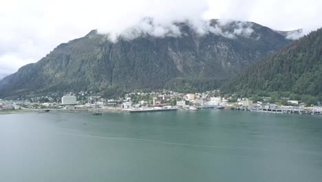 Downtown-Juneau-Alaska,-Aerial,-Wide-shot,-Alaskan-Mountain-Range-in-the-background