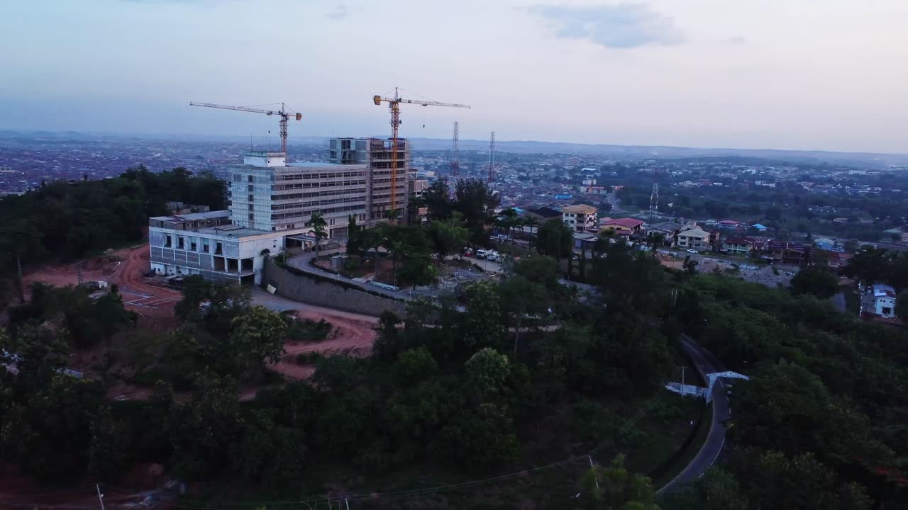 Beautiful aerial of a luxurious hotel under construction overlooking the city of Ibadan, Nigeria