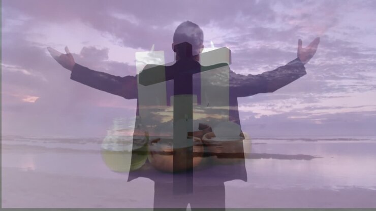 silhouette man raising arms on beach sunset, with animated cross and bowl icons showing health