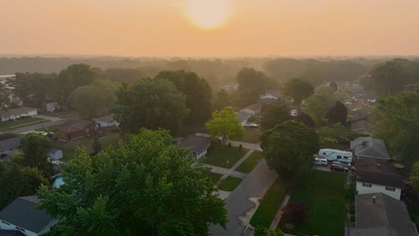 neighborhood from the air during wildfire smoke