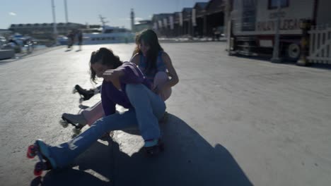 teenage girls roller skating at the port