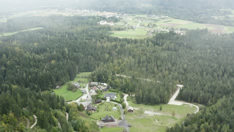 village of wildenstein with handcraft museum area near the waterfall in southern austria, flyover reveal shot