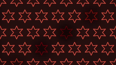 symmetrical red star pattern on a black background