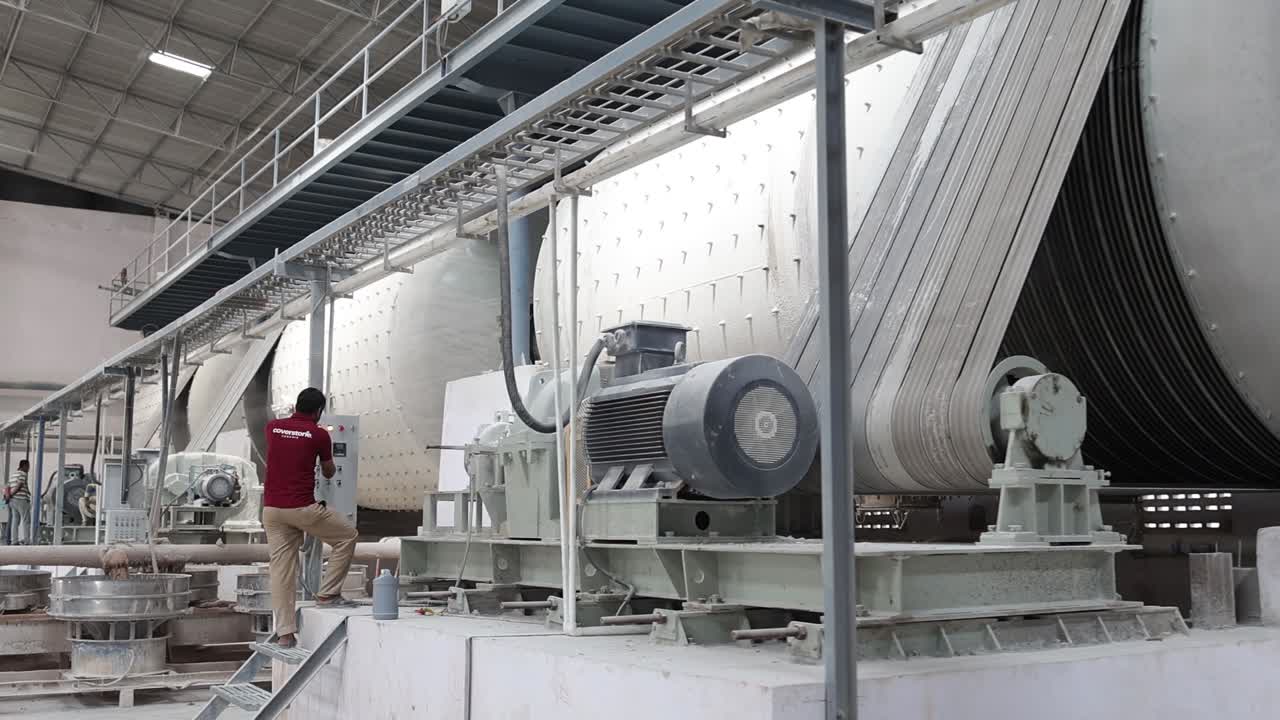 Industrial Manufacturing Plant with Large Machinery and Workers