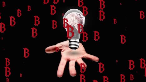 Animation-of-bitcoin-symbols-against-brain-inside-a-bulb-over-a-hand-against-black-background