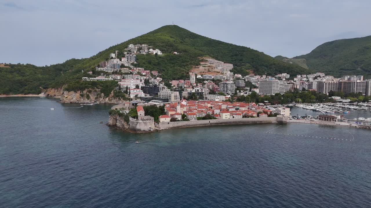 Aerial drone birds eye view budva Riviera old town city coastal montenegro balkan country balkans adriatic sea coastline Stari Grad sveti nikola island