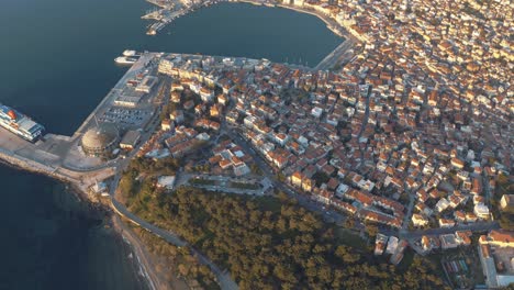 aerial view over port of lesbos in mytilene city, greece, drone perspective