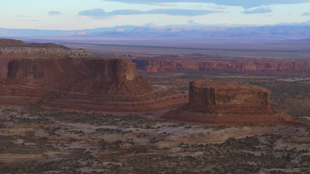 Scenic Moab desert landscape with sandstone mesa formations at sunset