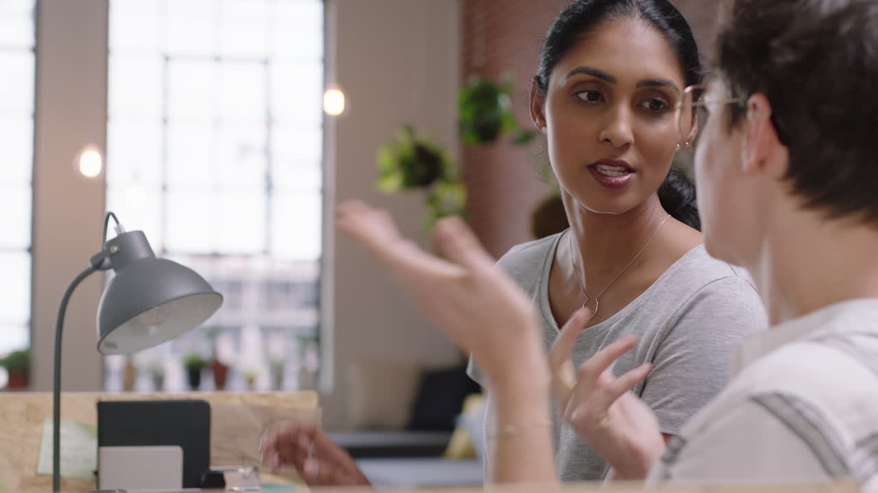 business woman architects brainstorming working together showing architecture plans on computer screen female engineers collaborating sharing design ideas enjoying creative development project